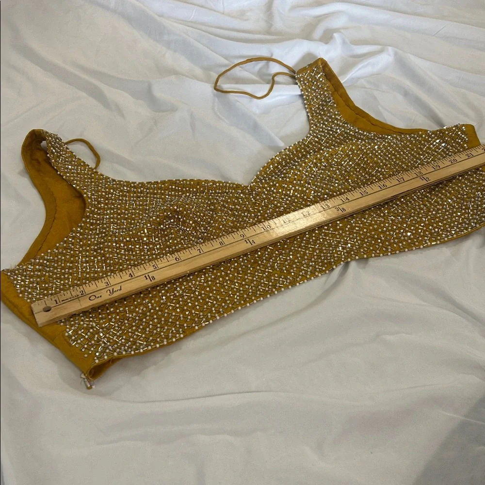 Lehenga charnyia choli yellow indian wedding wear gold. Net Duppatta
Pearls S. L - Picture 10 of 17